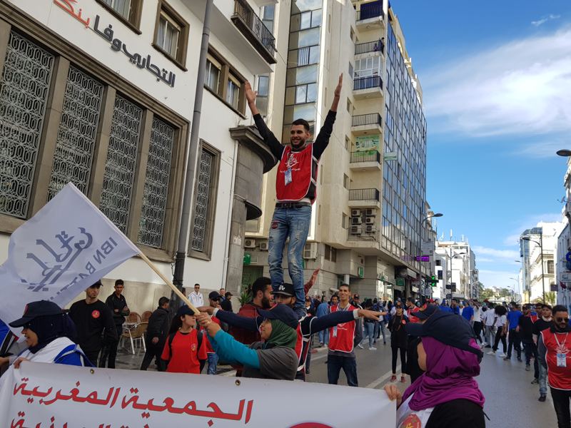 The Ibn Battuta flag carried at the head of the street carnival through central Tangier