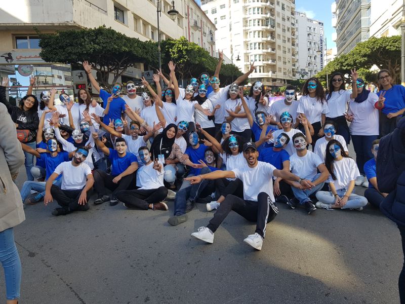 Performers in painted faces at the festival carnival in Tangier